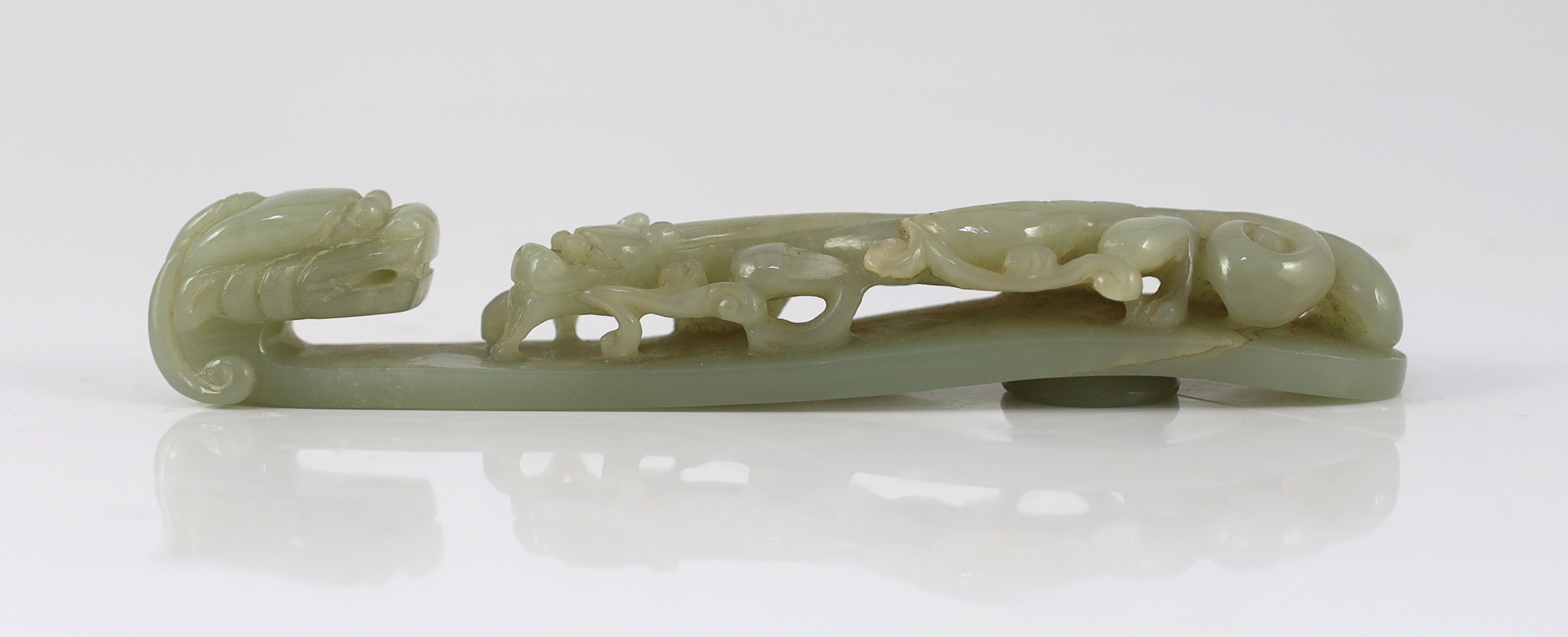 A large Chinese pale celadon jade ‘dragon’ belt hook, 18th/19th century